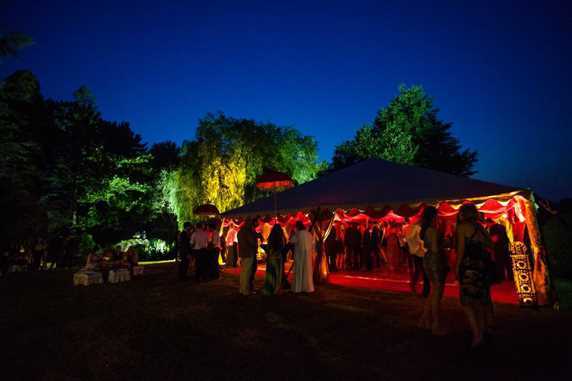 Magic was in the air when night fell on the party. The La Rouge party marquee looked exquisite next to the contrasting colours of the uplit trees and the deep blue summer sky.
